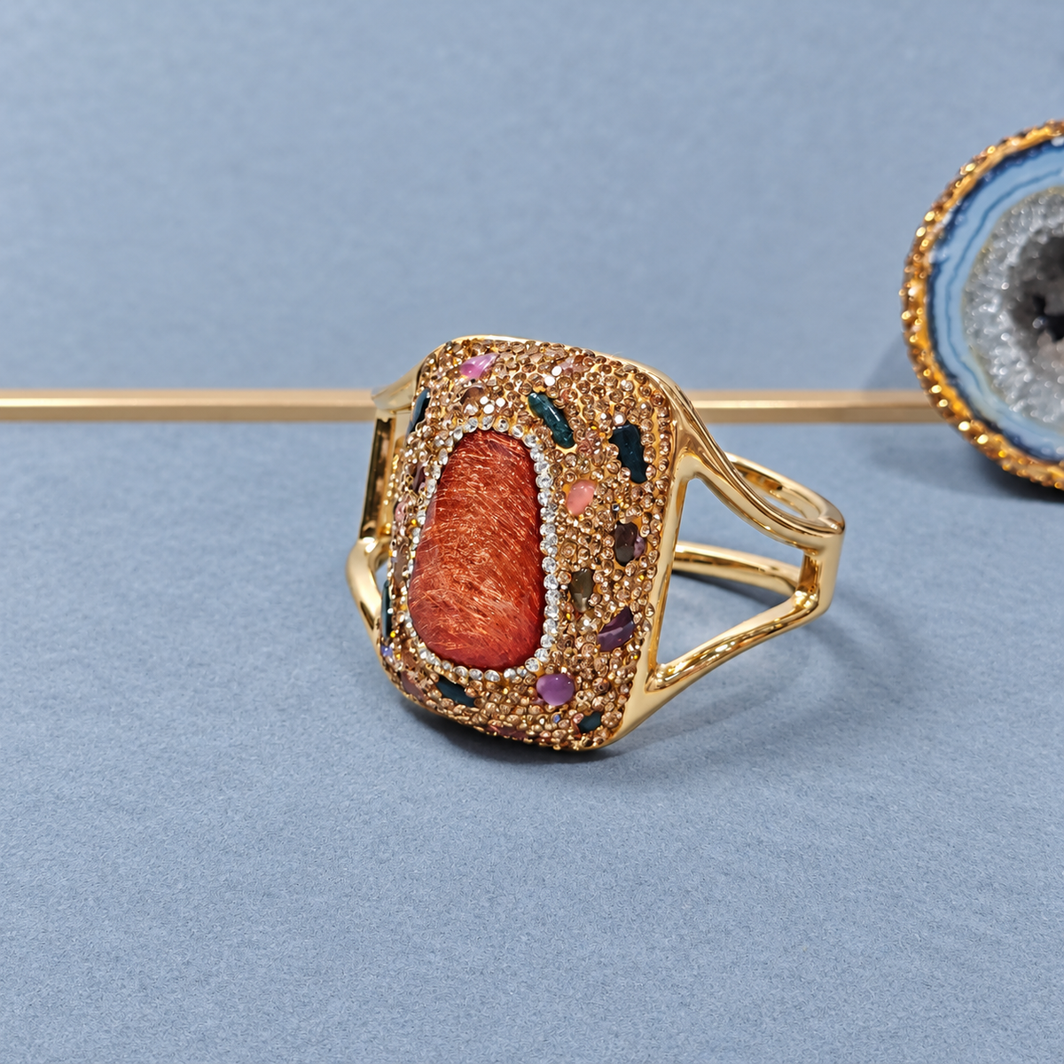 Bangle adorned with natural crystals and full rhinestones, sparkling statement piece