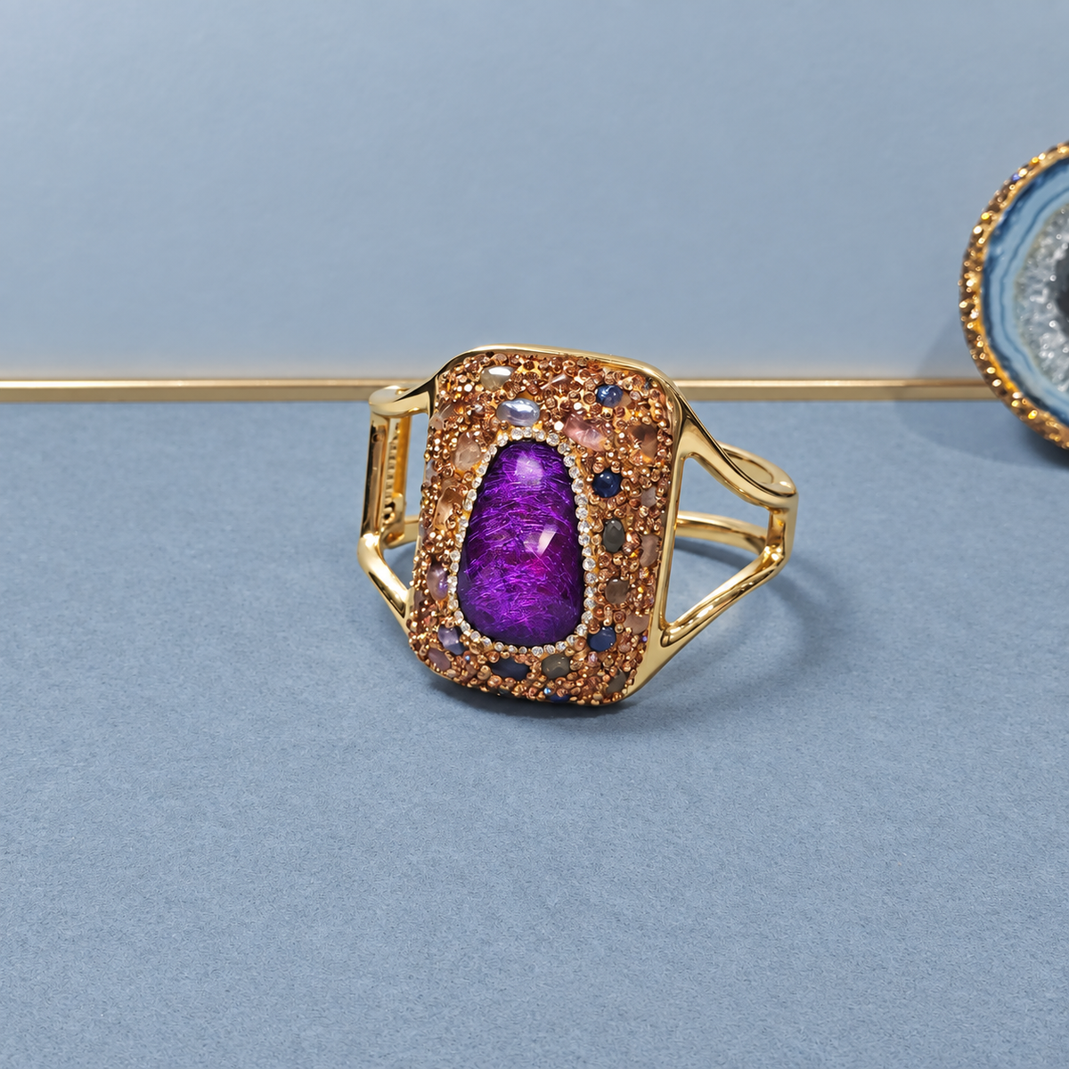 Bangle adorned with natural crystals and full rhinestones, sparkling statement piece