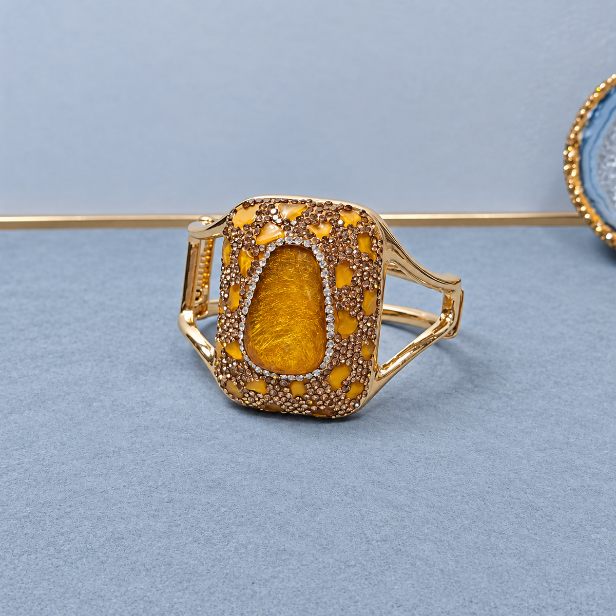 Bangle adorned with natural crystals and full rhinestones, sparkling statement piece