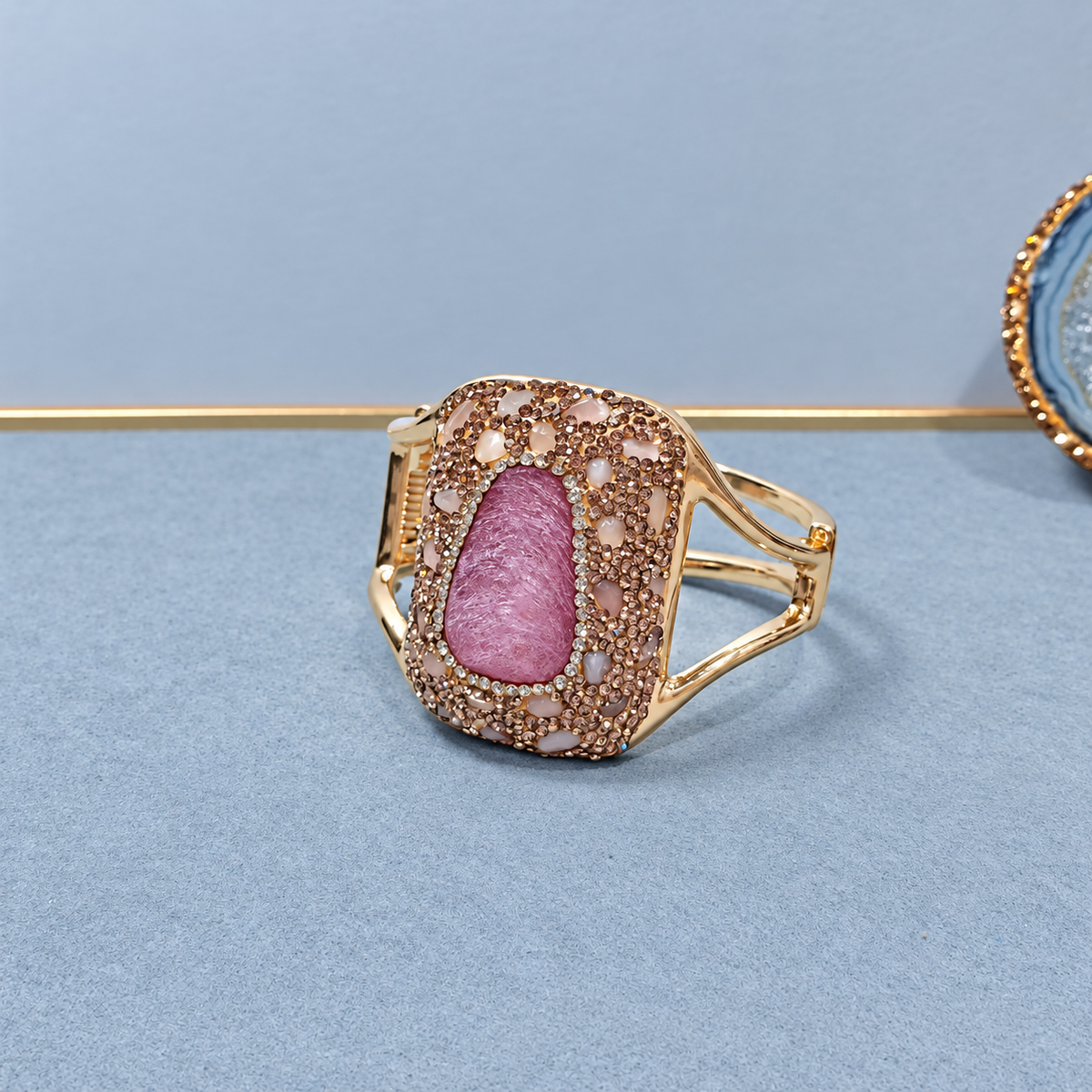 Bangle adorned with natural crystals and full rhinestones, sparkling statement piece