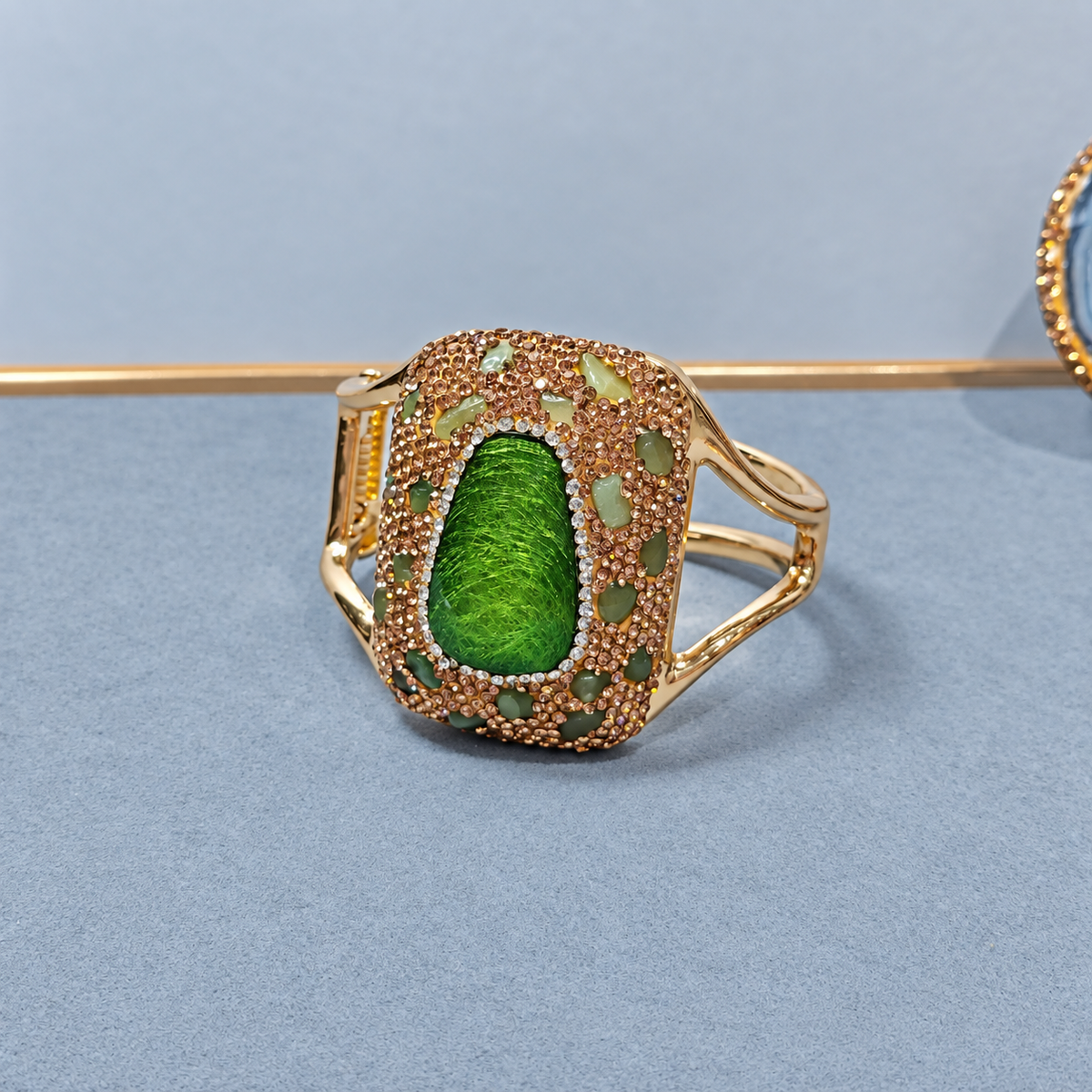 Bangle adorned with natural crystals and full rhinestones, sparkling statement piece